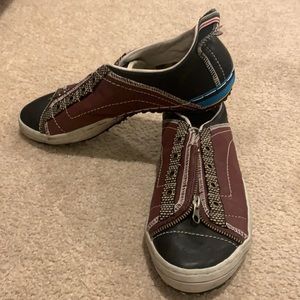 Bowling style tennis shoe that was aged when bought new. Only worn in house